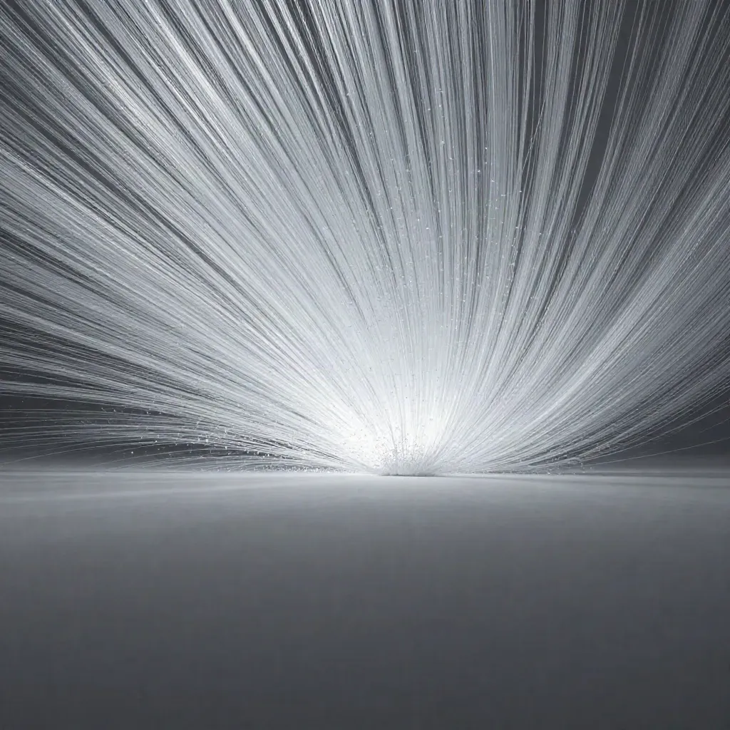 Silver filaments and grey motes converge into a white bloom in dark graphite haze.